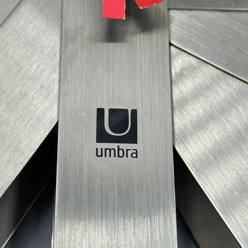 UMBRA wall clock by Michelle Ivankovic stainless steel ribbon sweep Seconds 12